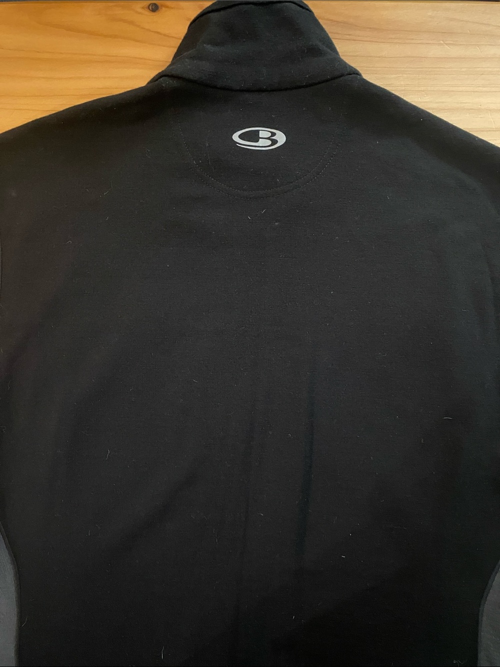 Icebreaker Black Merino Wool Full-Zip Vest with Chest Zip Pocket and side panels - Picture 9 of 9